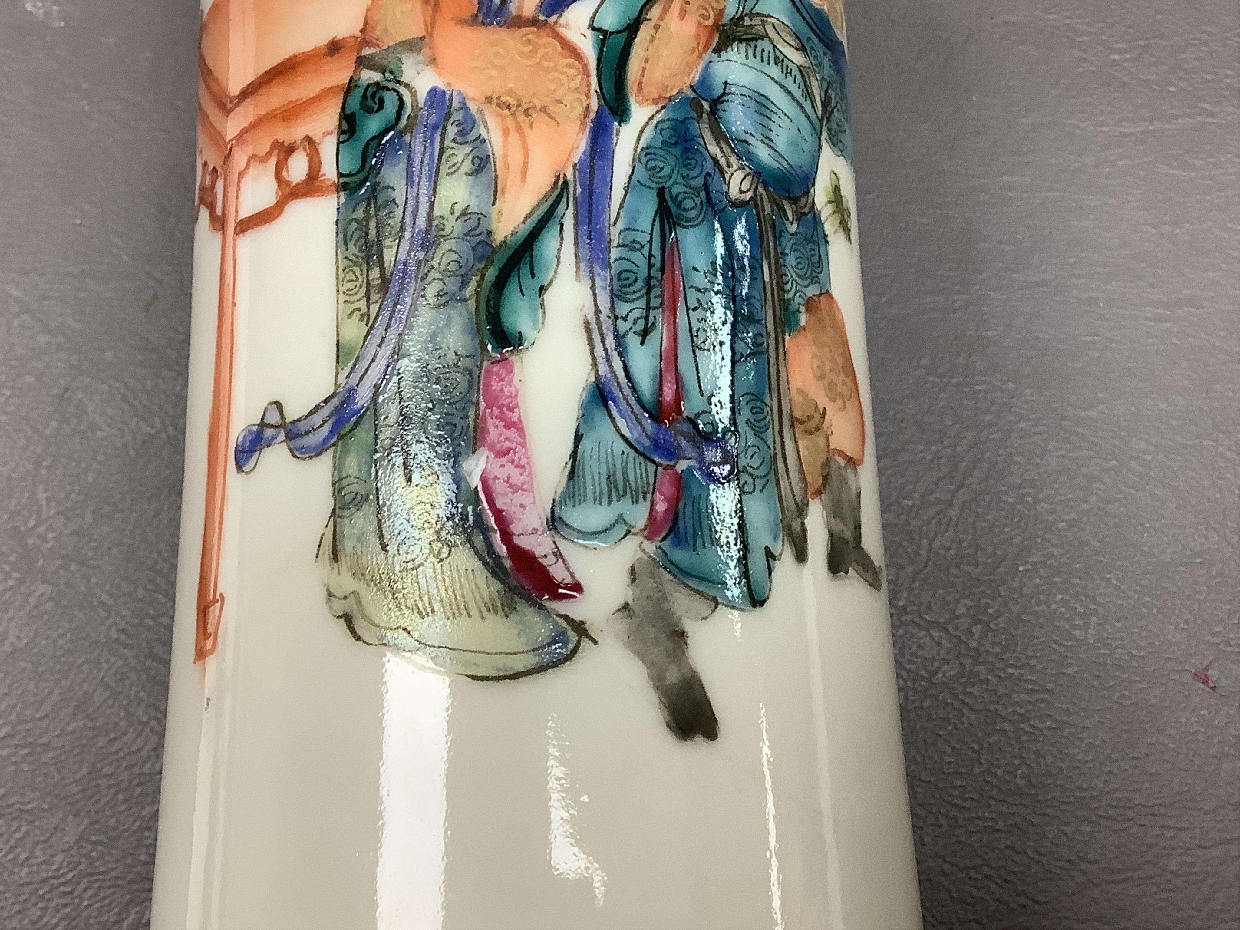 A 19th century Chinese famille rose brushpot, 22cm high, and a small pot (without cover)